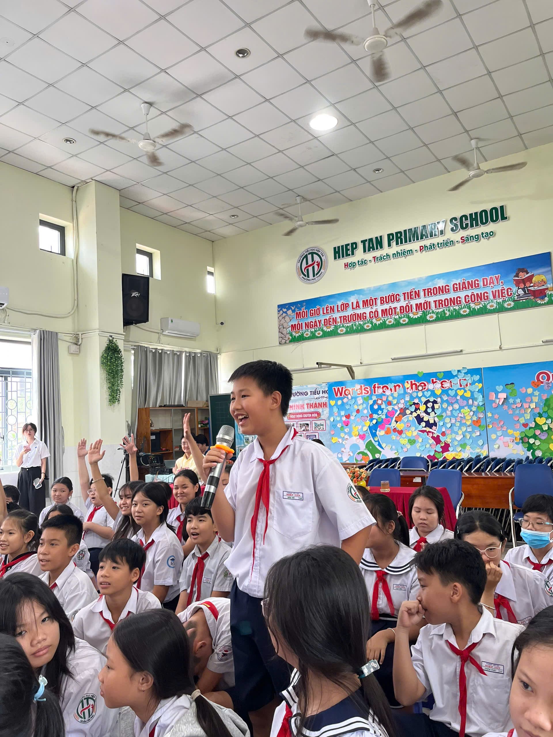 Students writing reflections after a Famaca reading event